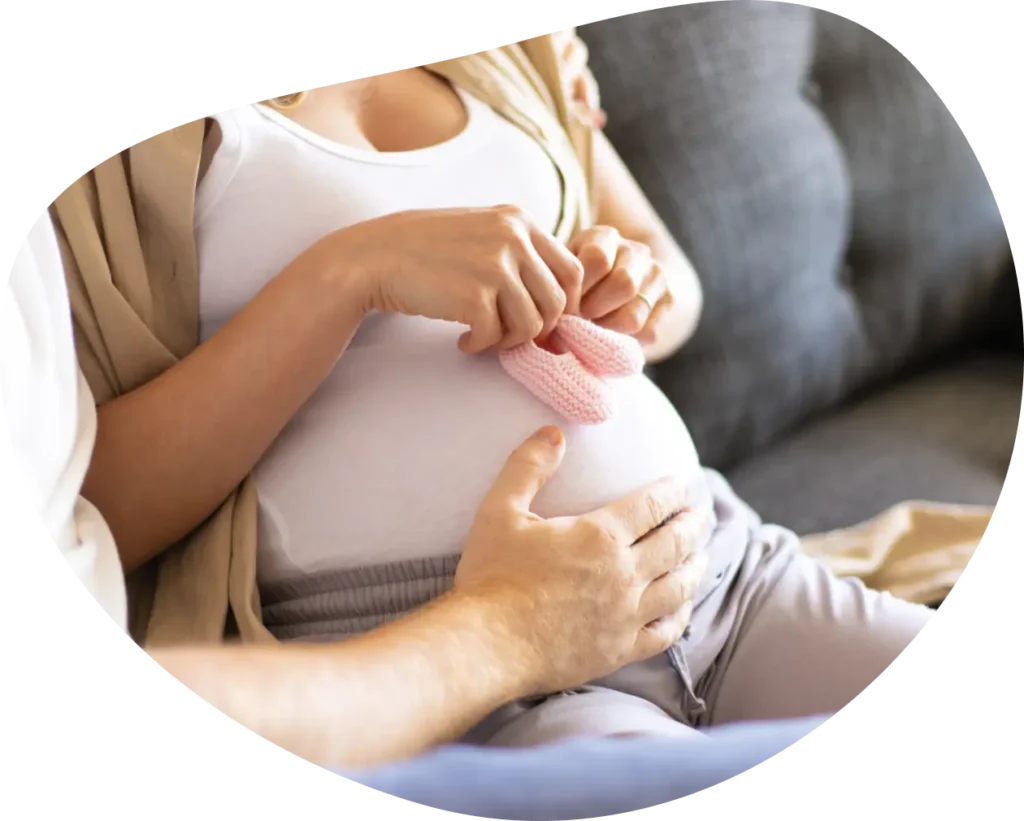 Happy family after fertility treatment at FertilyMed Cancún