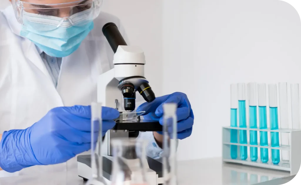 Embryologist working in FertilyMed laboratory with RI Witness system